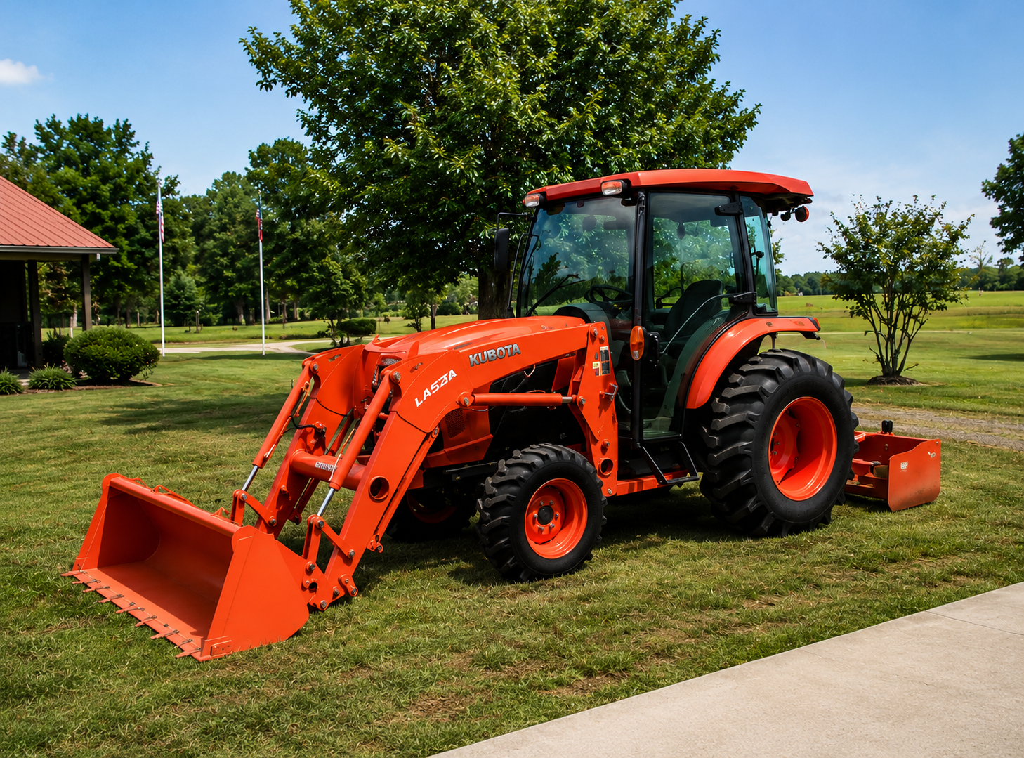 Kubota tractor with front loader and box blade